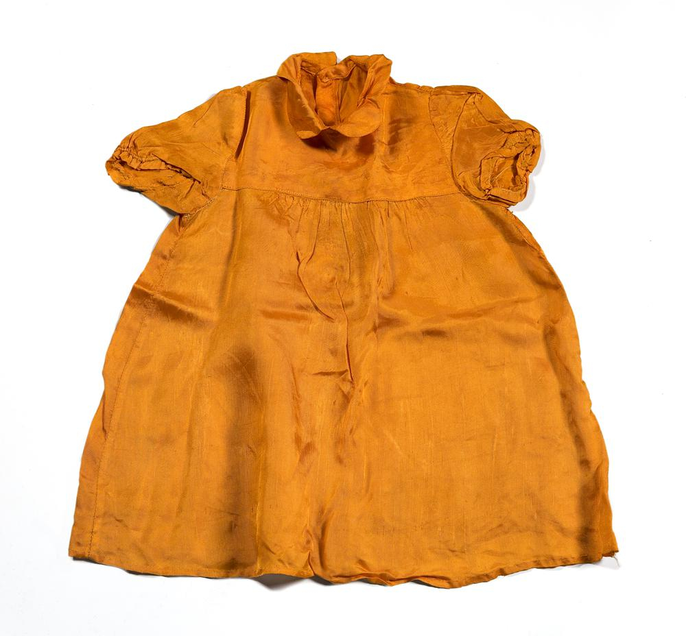 Foto van oranje kinderjurkje van Elianne Muller